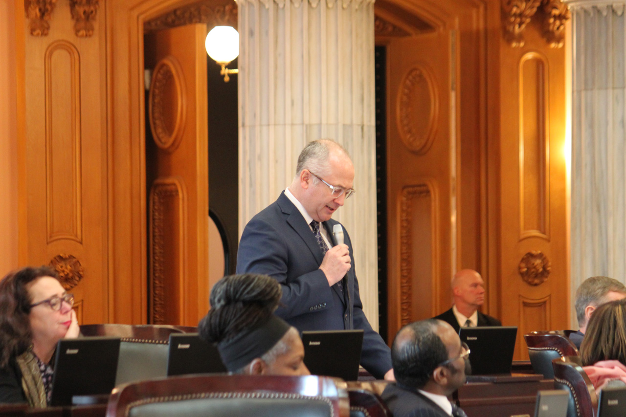 Rep. Smith speaking on the House floor during session