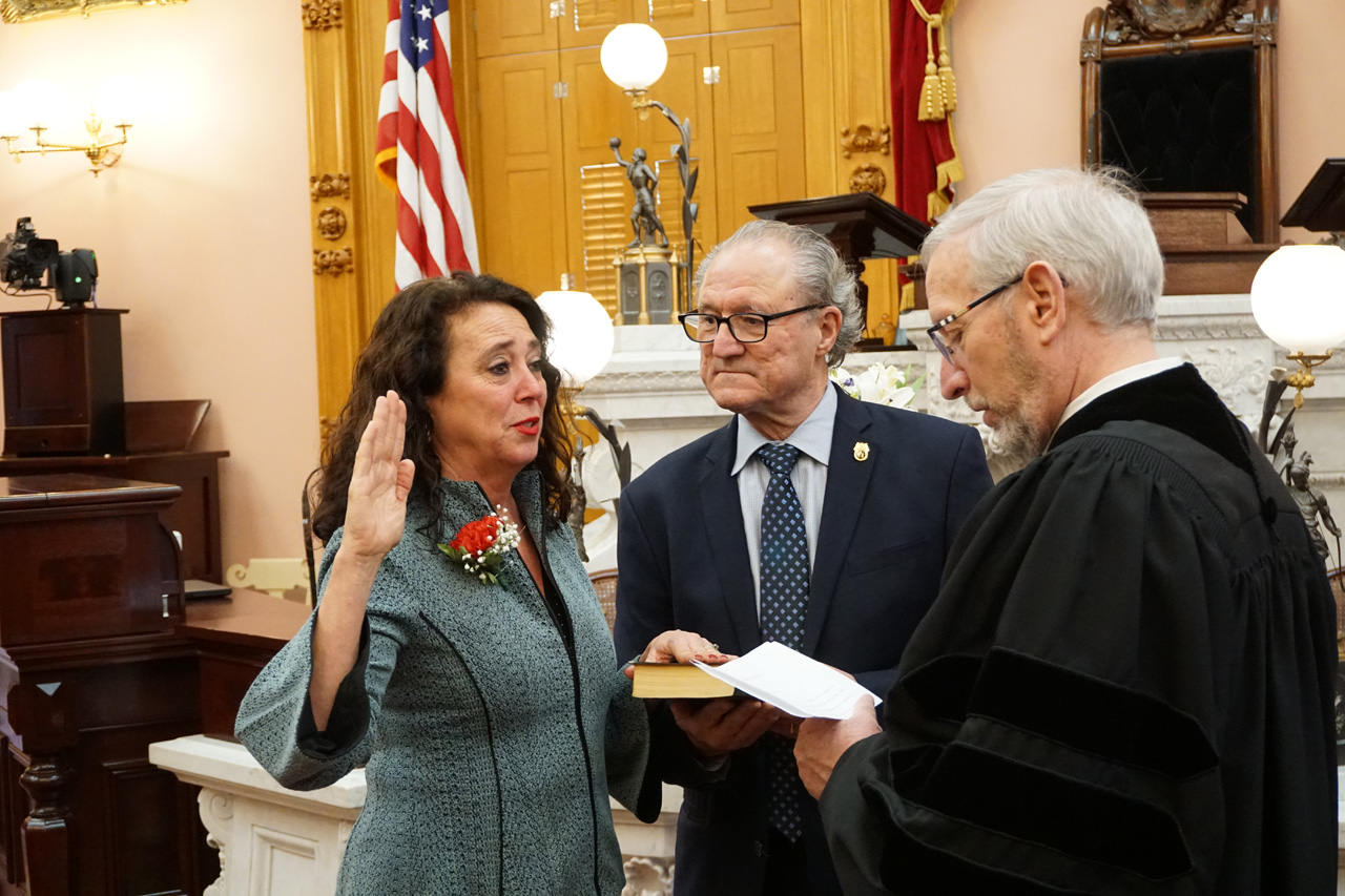 State Representative Michele Lepore-Hagan is sworn in to the 133rd General Assembly alongside her husband