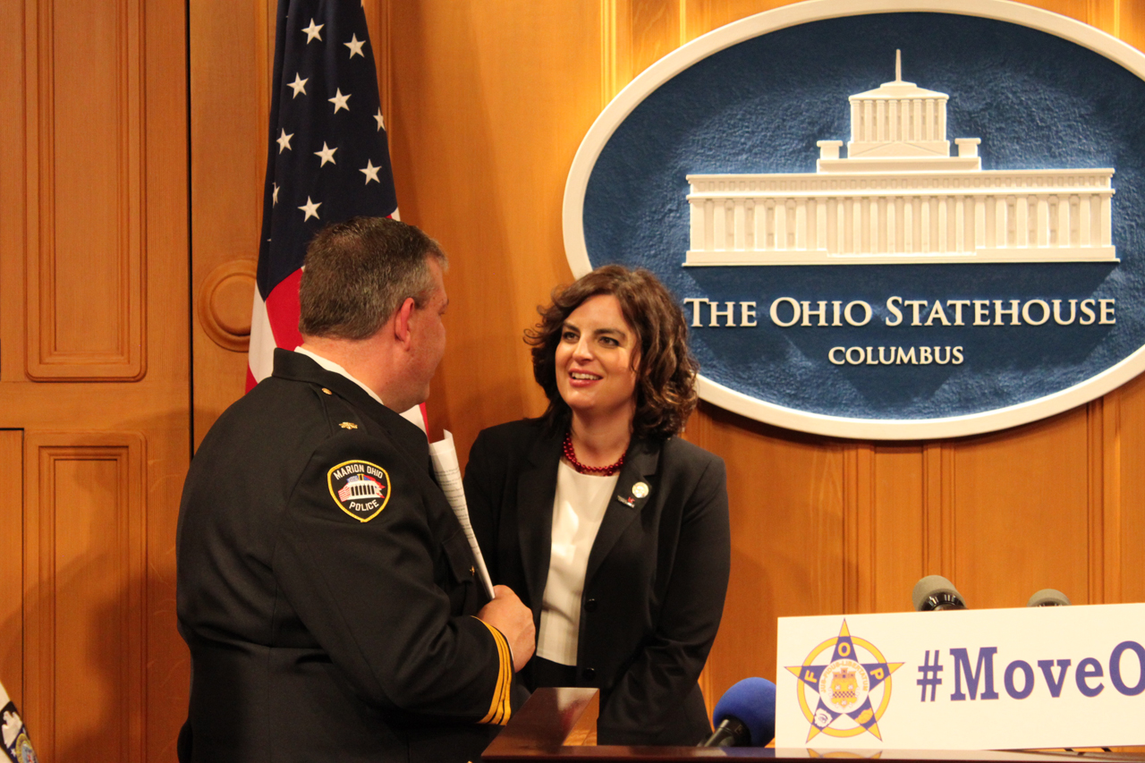 Rep. Kelly speaks with Fraternal Order of the Police president, Jay McDonald