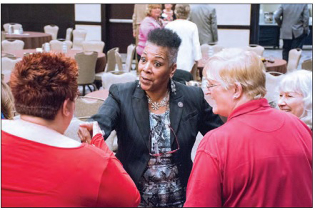Rep. Ingram speaks with attendees following her Closing Luncheon presentation. Ingram served as Ohio School Board Association President in 2005.