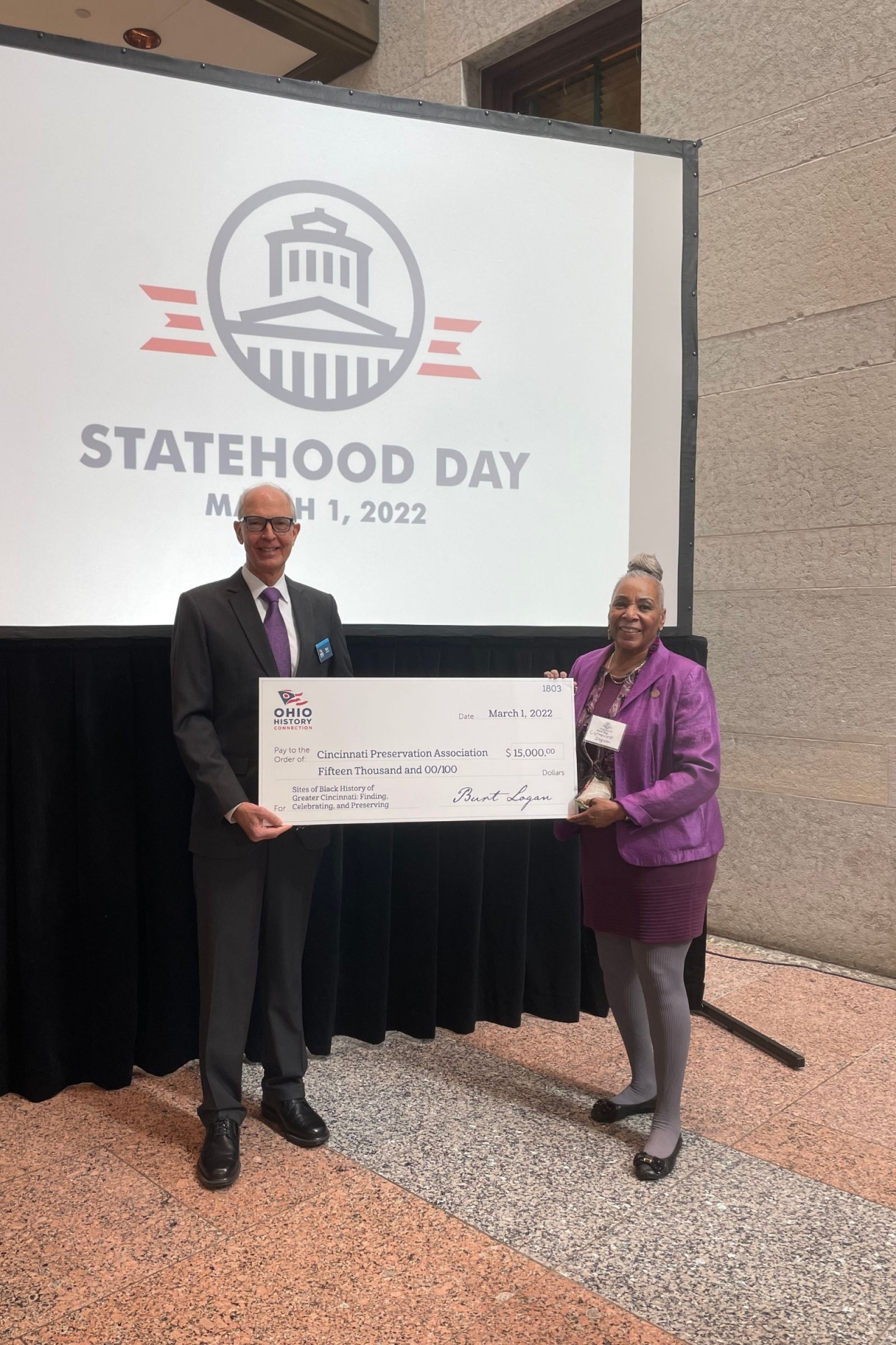 Rep Ingram and the Ohio History President at Statehood Day - She is pictured with the check for The Cincinnati Preservation Association, that was awarded an Ohio History Fund Grant.
