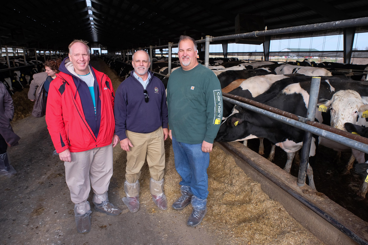 Reps. Becker, left, Koehler, center, and Kick tour the Twin Oaks Dairy farm in South Solon, Ohio, Dec. 4, 2017.
