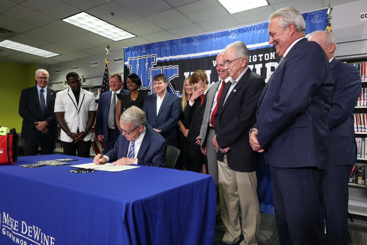 Rep. Brown witnesses Governor DeWine sign HB 47 into law, ensuring students and athletes have access to an AED.