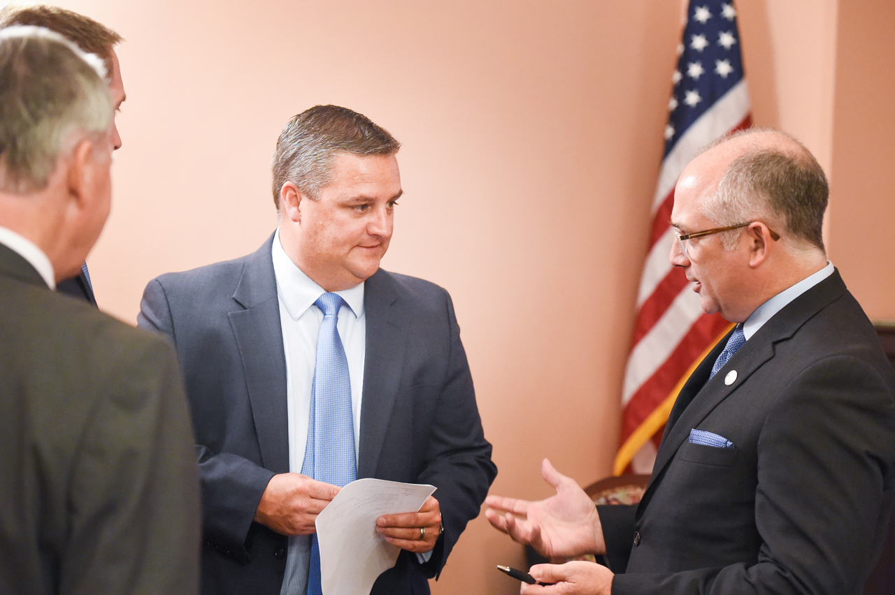 Rep. Wilkins confers with other Representatives during Education and Career Readiness Committee hearing June 26, 2018.