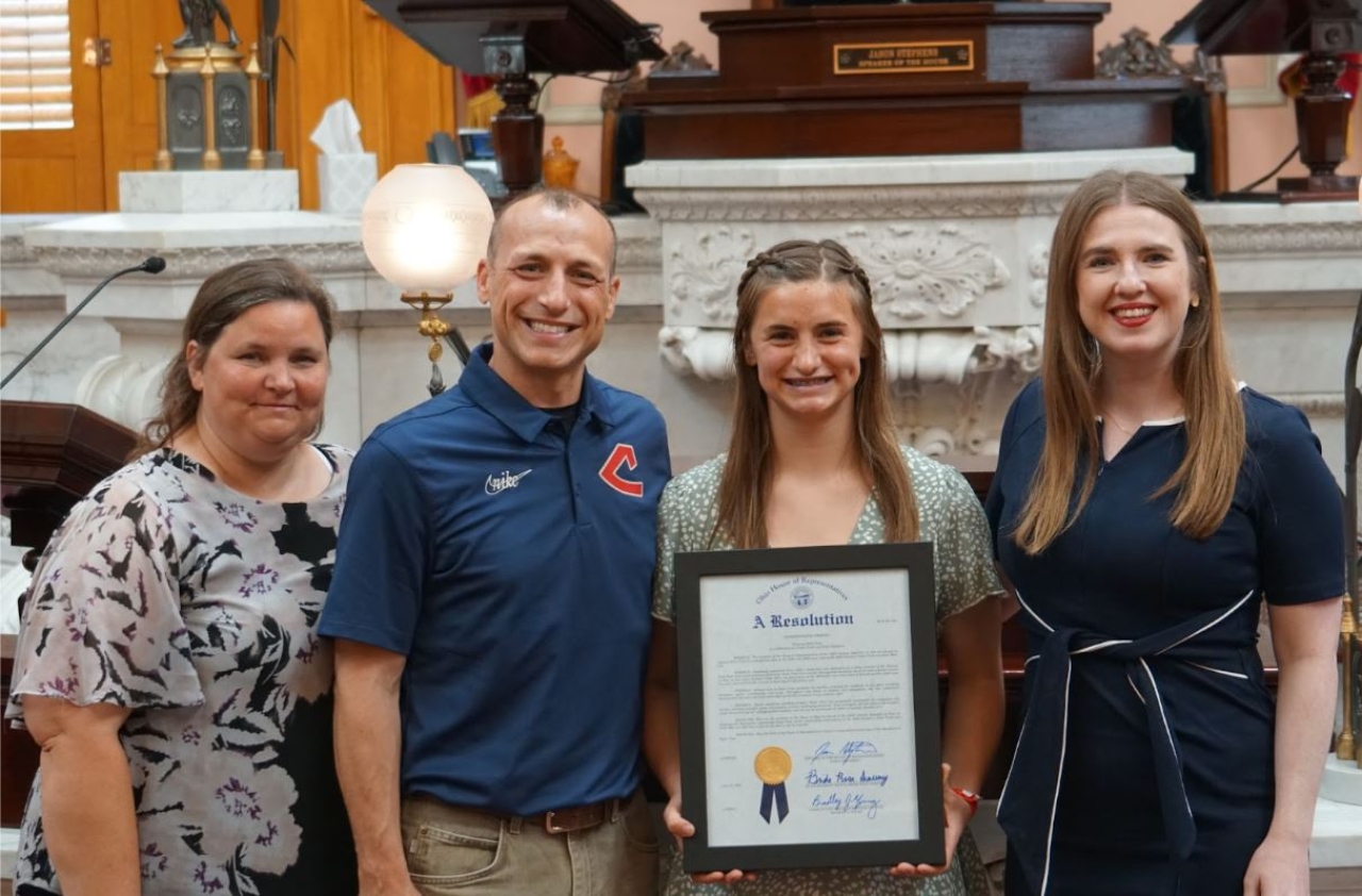 Rep Sweeney presents an Ohio House Resolution honoring Katie Clute of Olmsted Falls, OH on winning her second Division I track and field state champion.