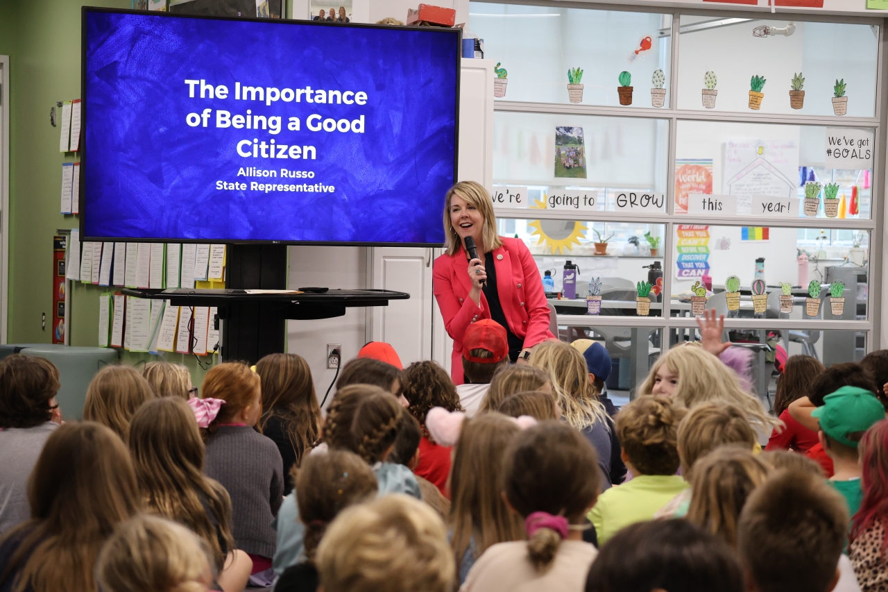 Leader Russo speaking at an Upper Arlington Elementary School