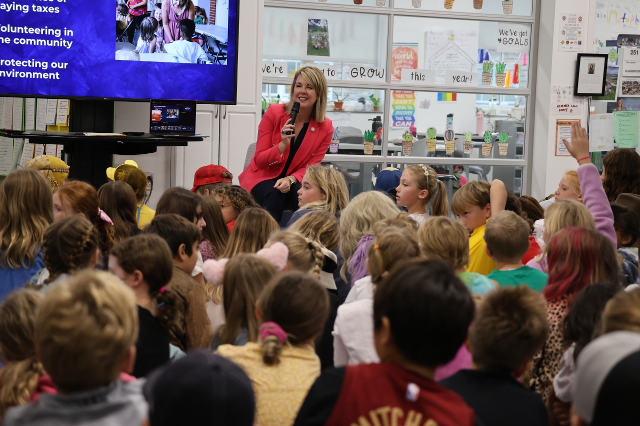 Leader Russo speaking at an Upper Arlington Elementary School