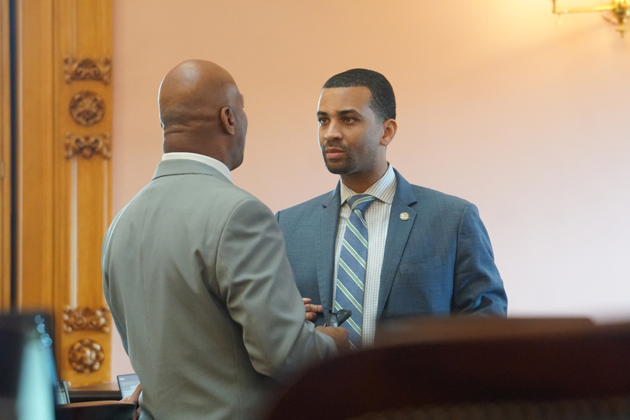 Re. Denson talks with Rep. West before session begins