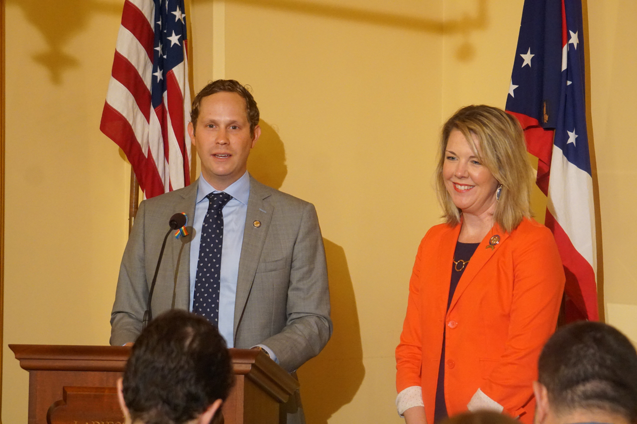 Rep. Weinstein speaks at a press conference on Madeline's Law, legislation to require health insurance coverage of hearing aids for children, alongside Rep. Allison Russo (D-Upper Arlington)