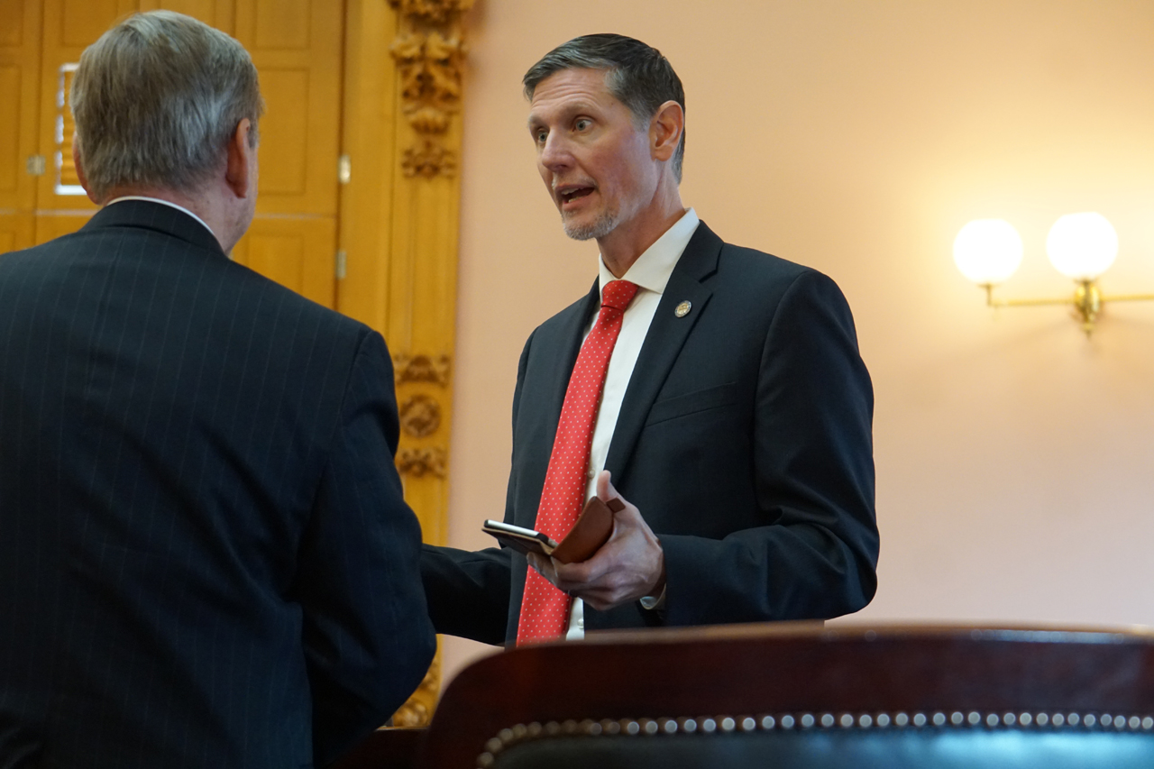 Rep. Miller talks with Rep. John Patterson (D-Ashtabula) after House Session