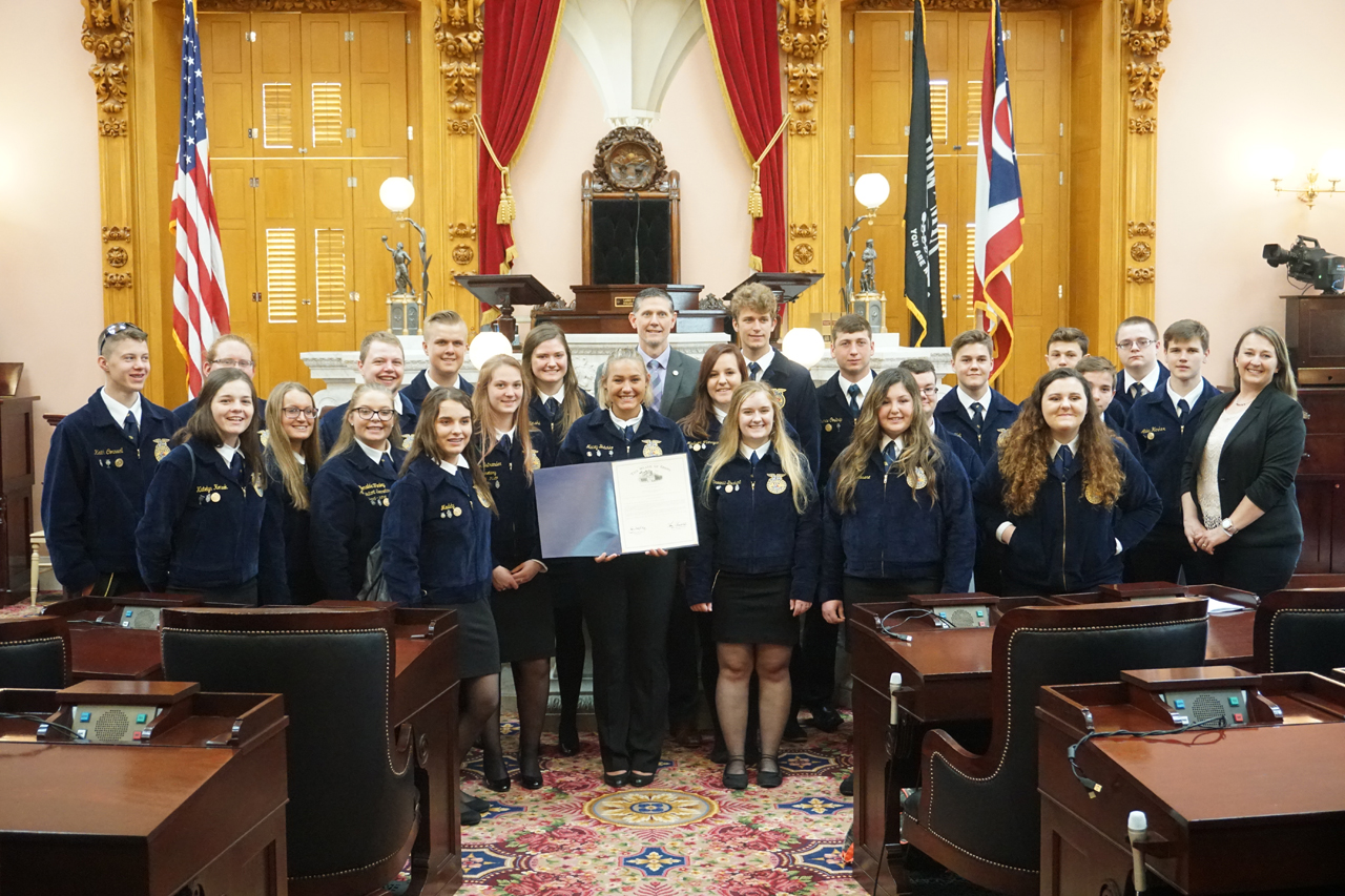 Rep. Miller presents a commendation to Firelands High School FFA students in the House chamber