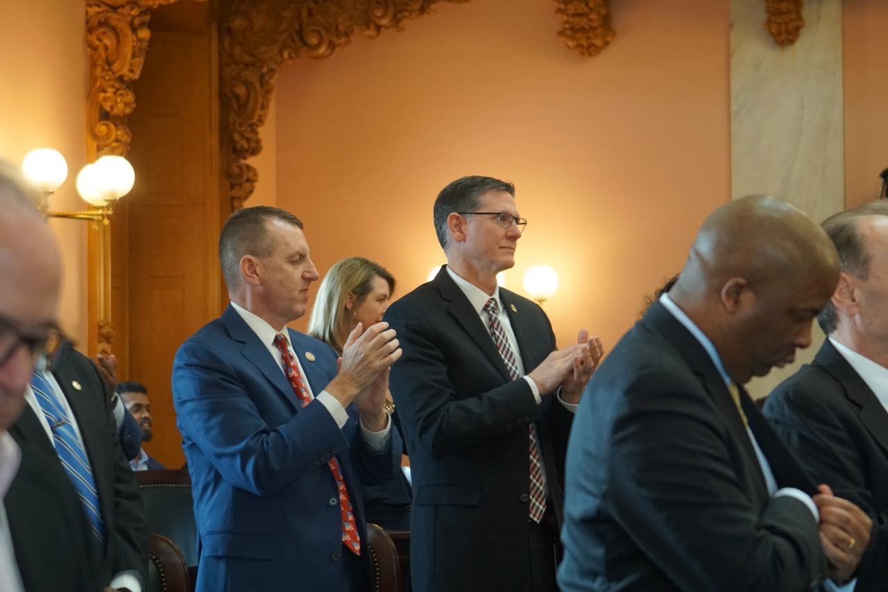 Rep. Miller applauds during the State of the State Address