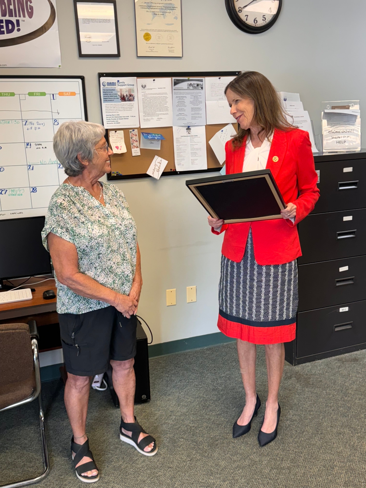 Representative Richardson presented Penny Wood with a commendation for the innovative transportation services she provides to the residents of Marysville.