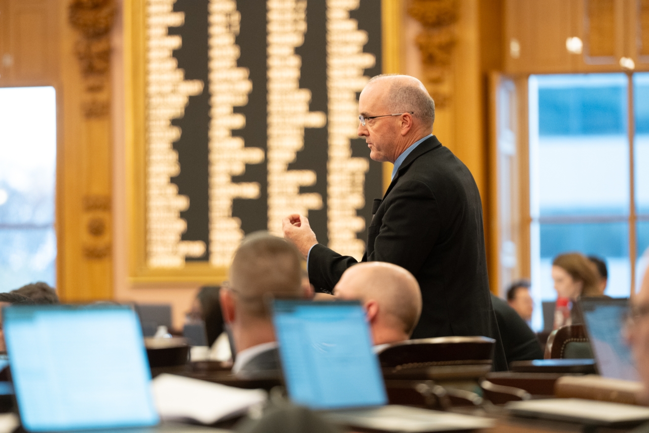 Rep. Holmes speaks on the House floor during session