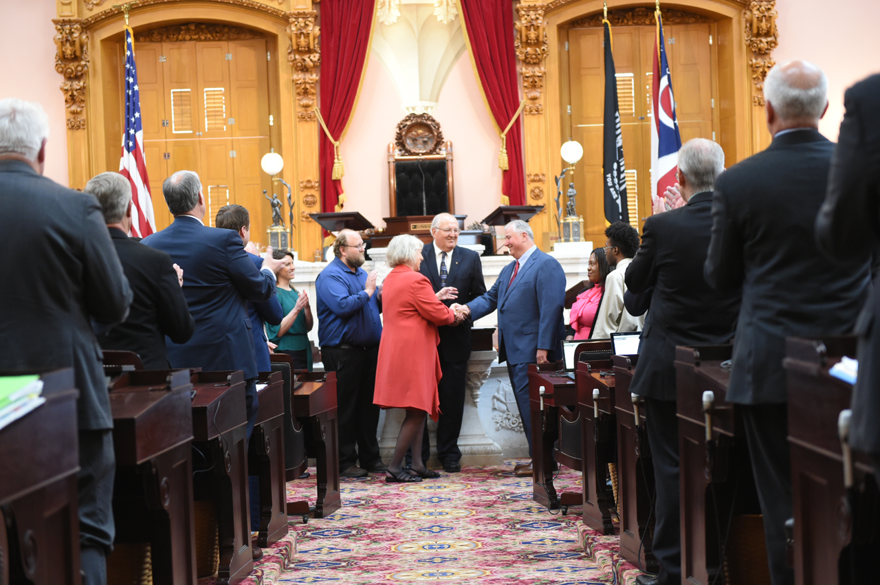 Rep. Grendell shakes the Speaker's hand following her swearing in