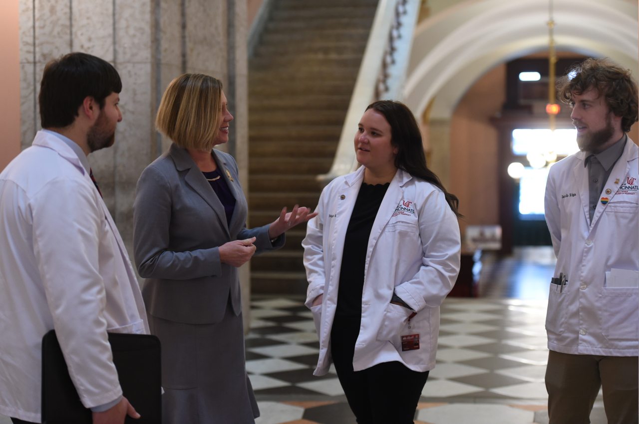 Representative Abrams gives a tour around the Statehouse to UC Pharmacy students.
