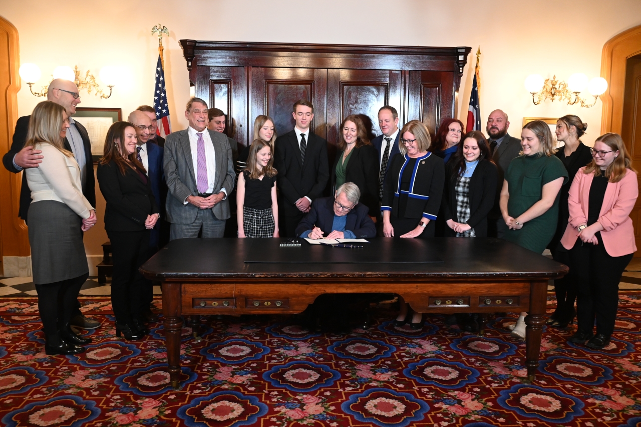 Ohio Governor DeWine signs bill sponsored by Abrams to protect Ohio children from sexual abuse.