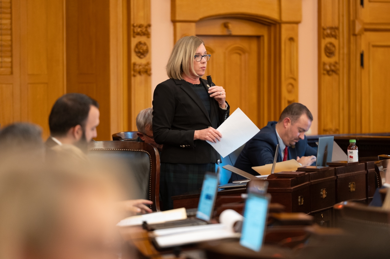 Rep. Abrams speaks on the House floor during session