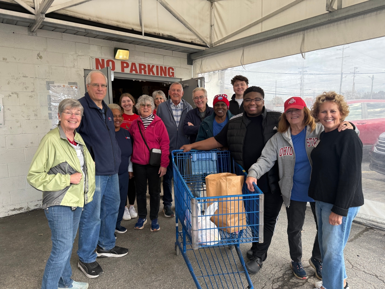 Rep. Jarrells poses with volunteers at the NNEMAP Food Pantry in Columbus.