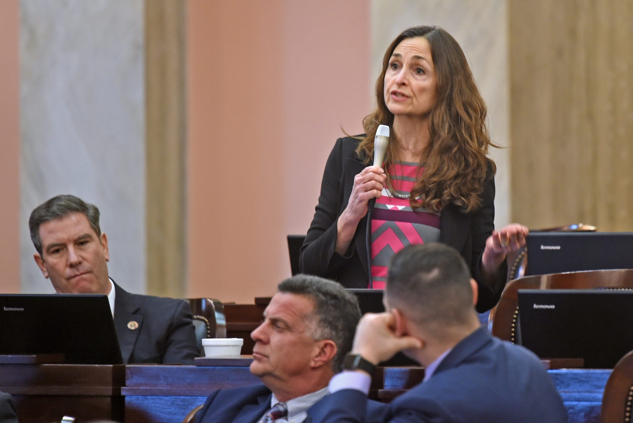 Representative White gives a speech on the House floor prior to a vote for the passage of House Bill 427 to help victims of human trafficking.