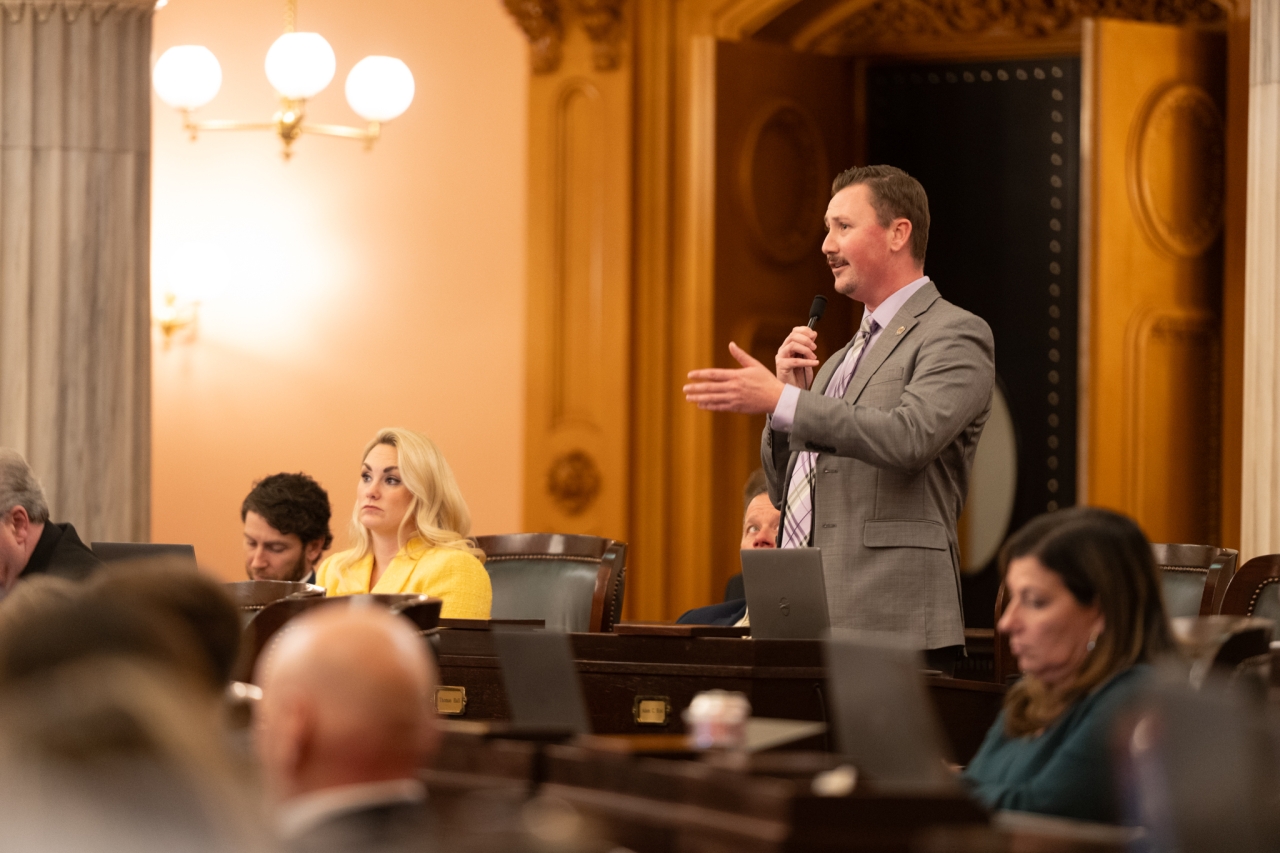 Rep. Hall speaks on the House floor during session.