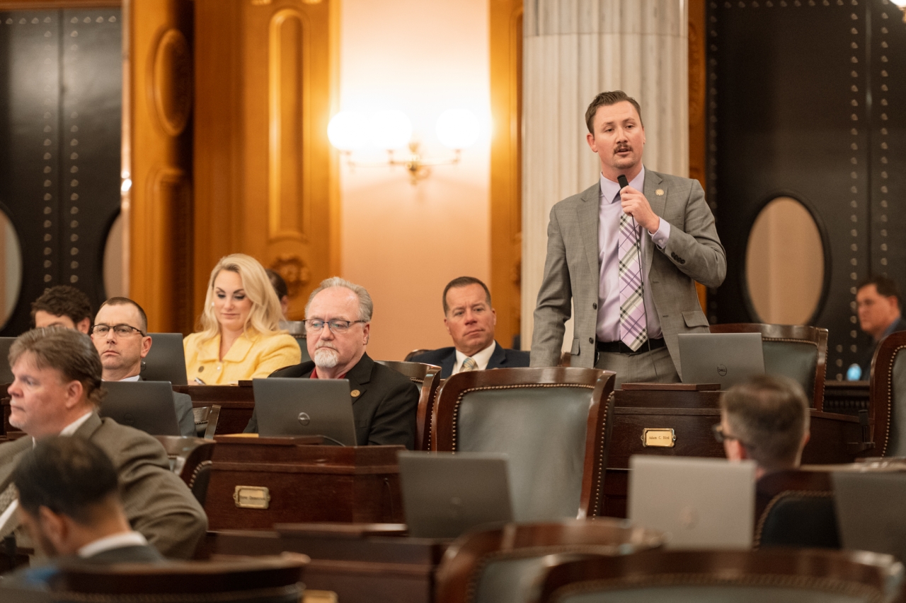 Rep. Hall speaks on the House floor during session.