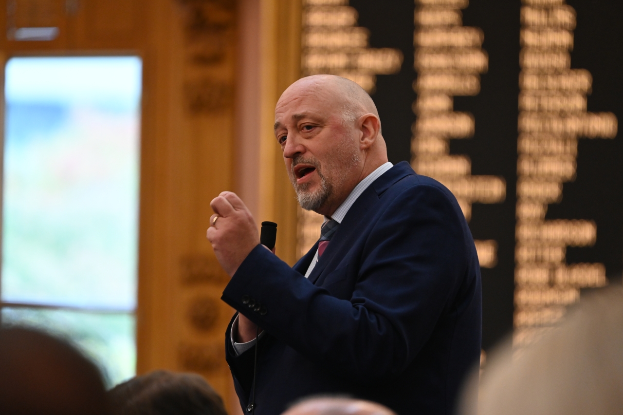 Rep. Click speaks on the House floor during session