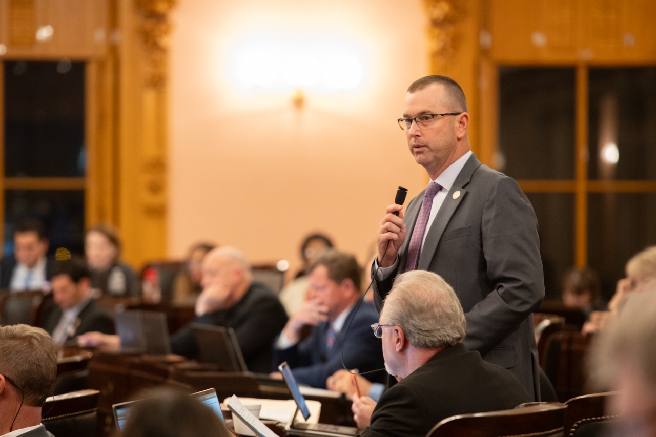 Rep. Miller speaks on the House floor during session