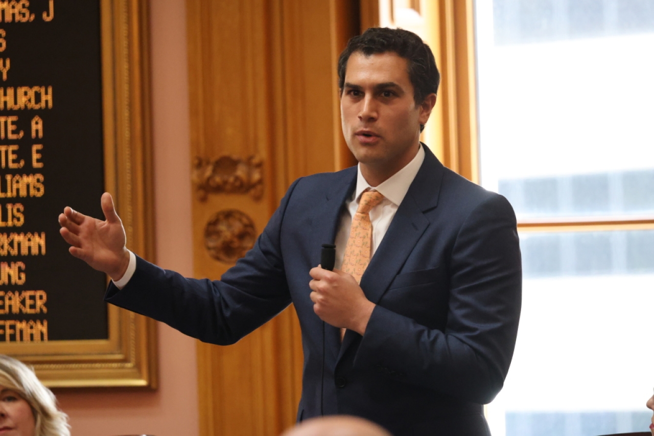 Leader Isaacsohn speaks on the house floor during session