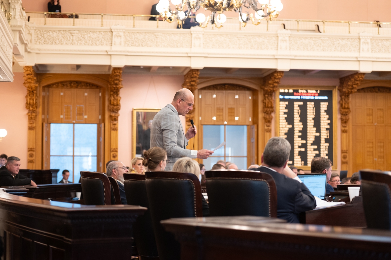 Rep. Thomas speaks on the House floor during session.