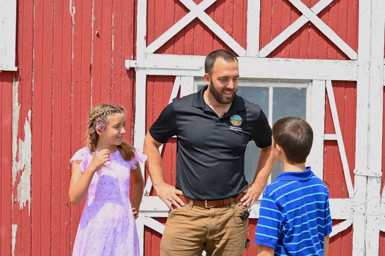 Rep. Adam Mathews talks with his kids at the Warren County Fair