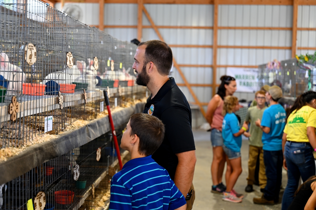 Rep. Adam Mathews and his son enjoy a day at the Warren County Fair