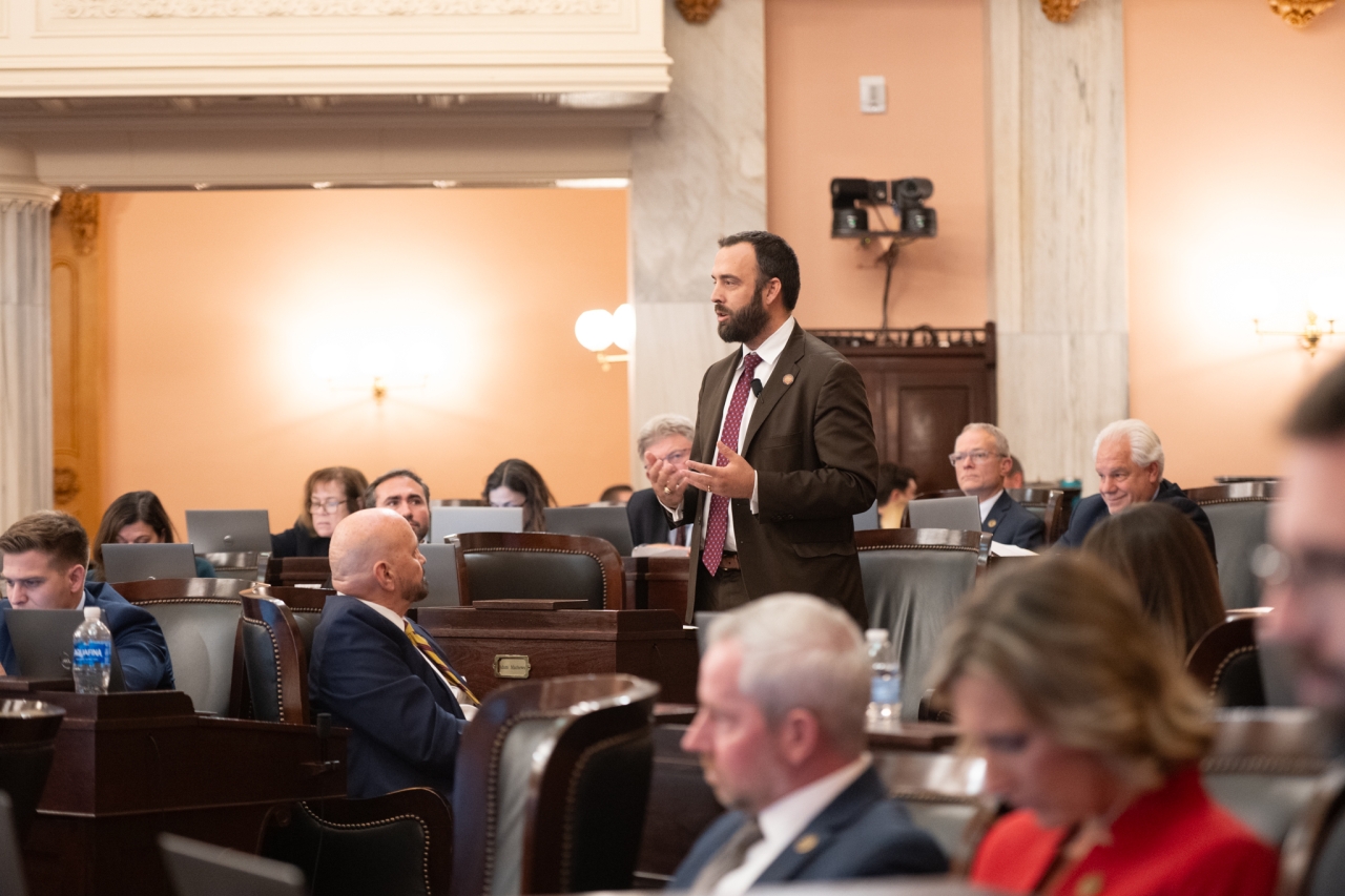 Rep. Mathews speaks on the House floor during session.