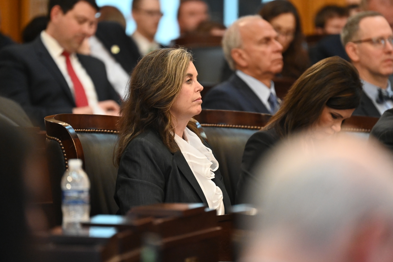 Representative Lear listens to Governor Mike DeWine give his State of the State Address.