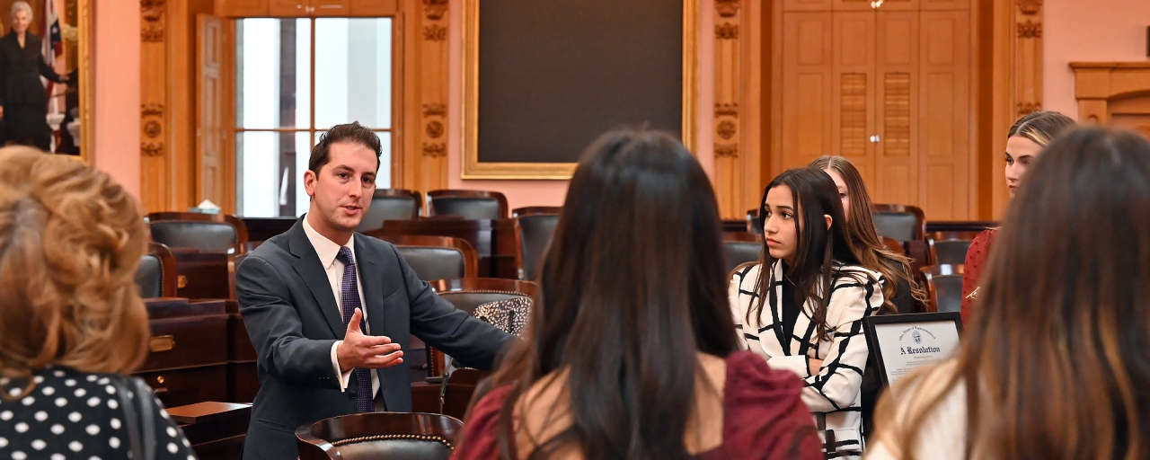 State Rep. Santucci meets with students from the district at the Statehouse.