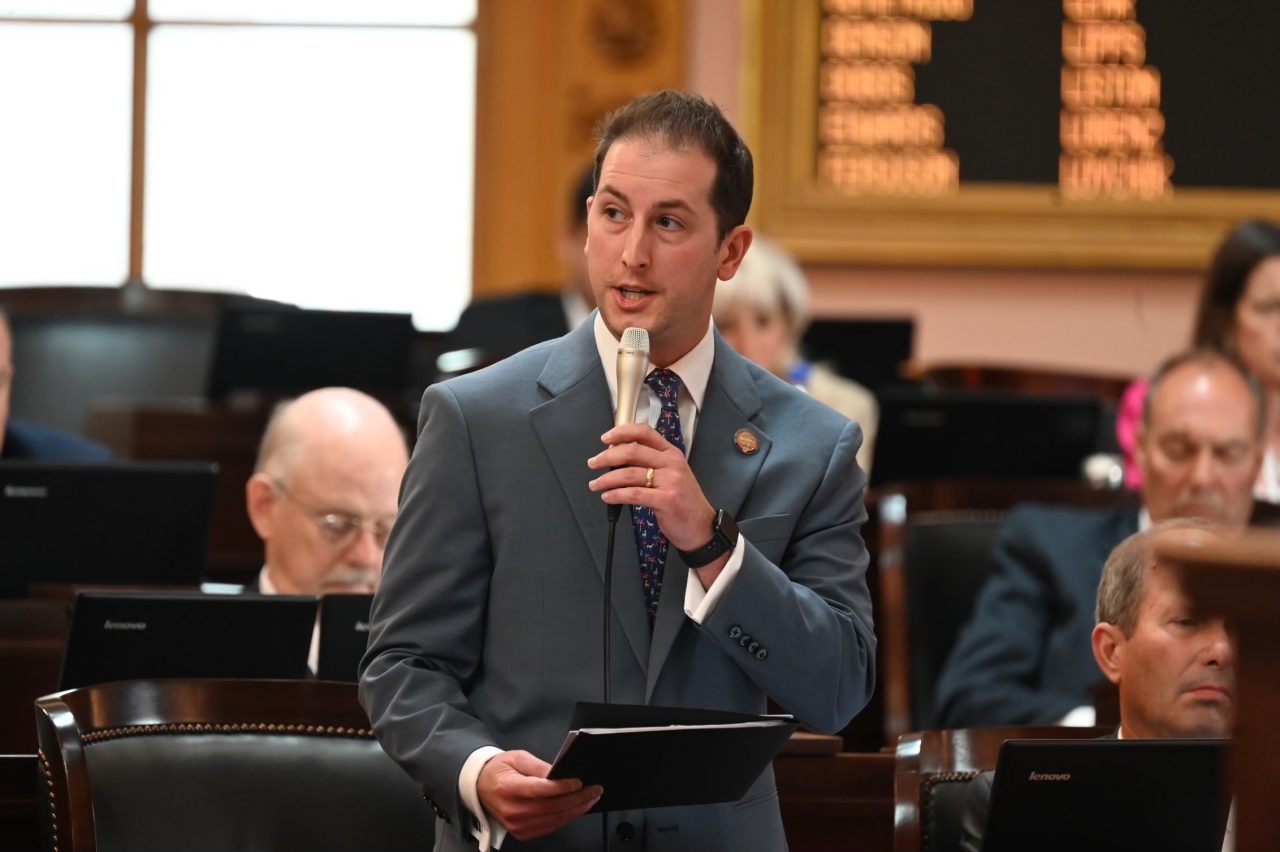 State Rep. Santucci speaking on the House floor during session.