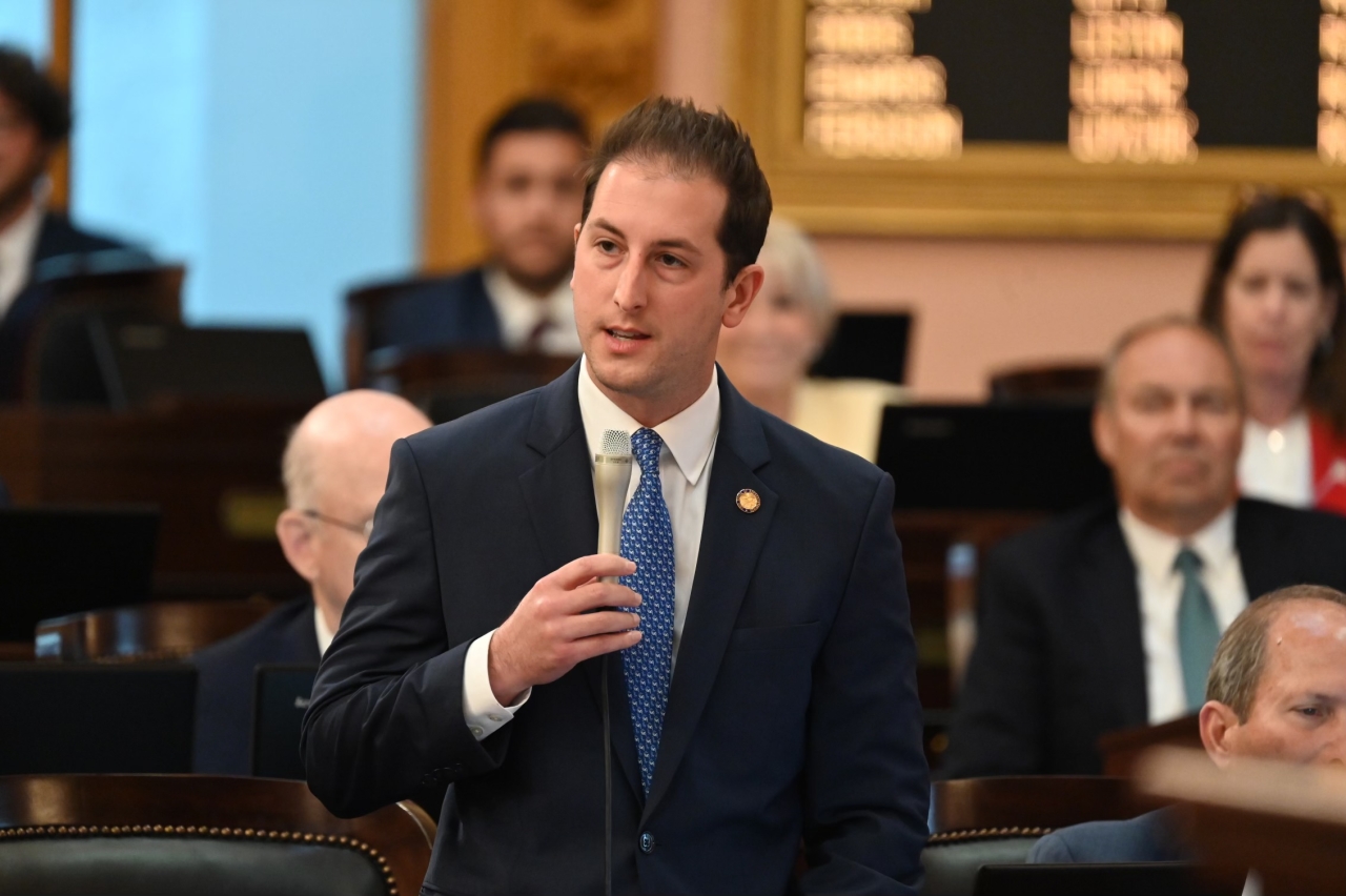 State Rep. Santucci speaks on the floor during a House session.