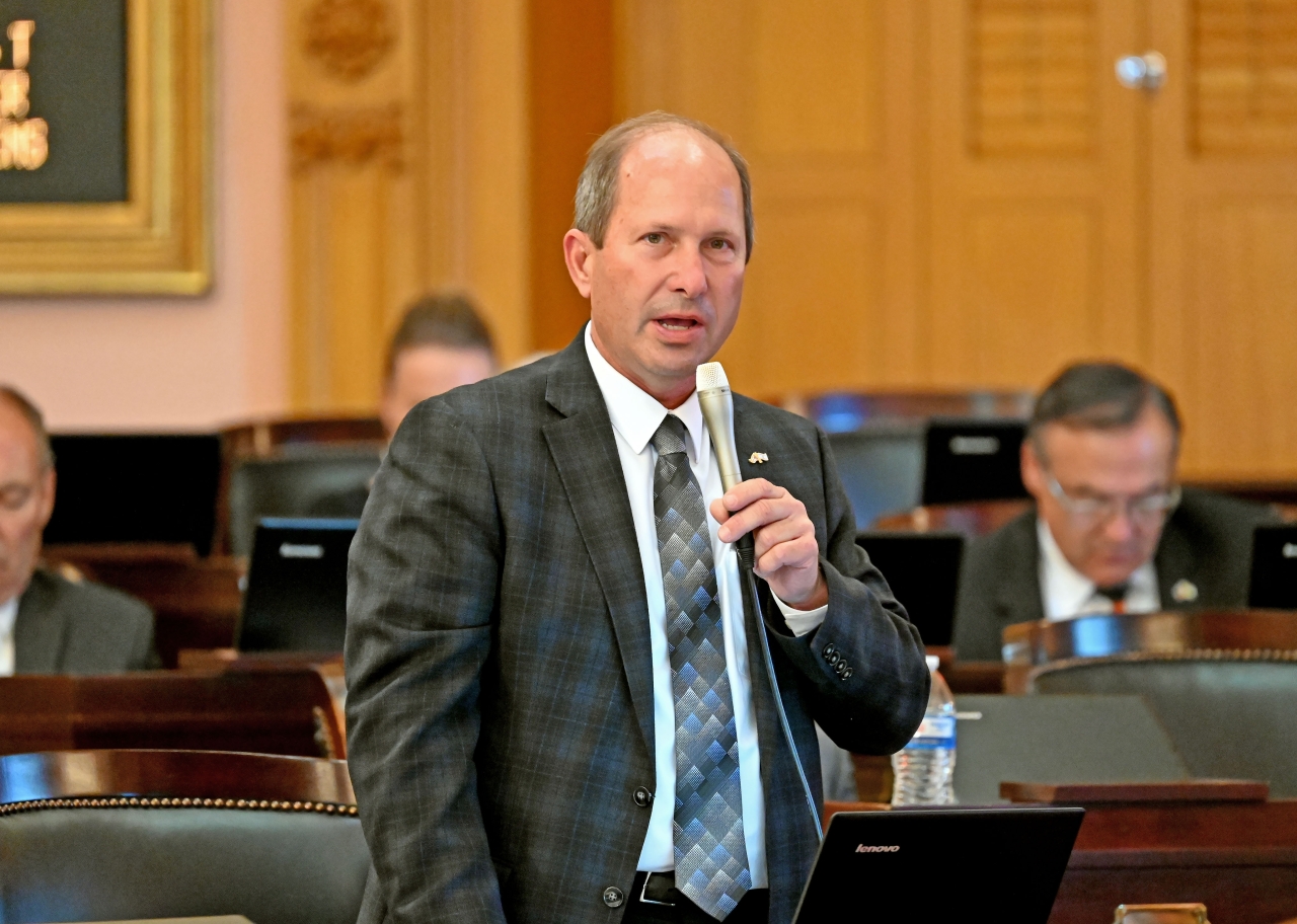 Rep. Klopfenstein speaks on the House floor during session.