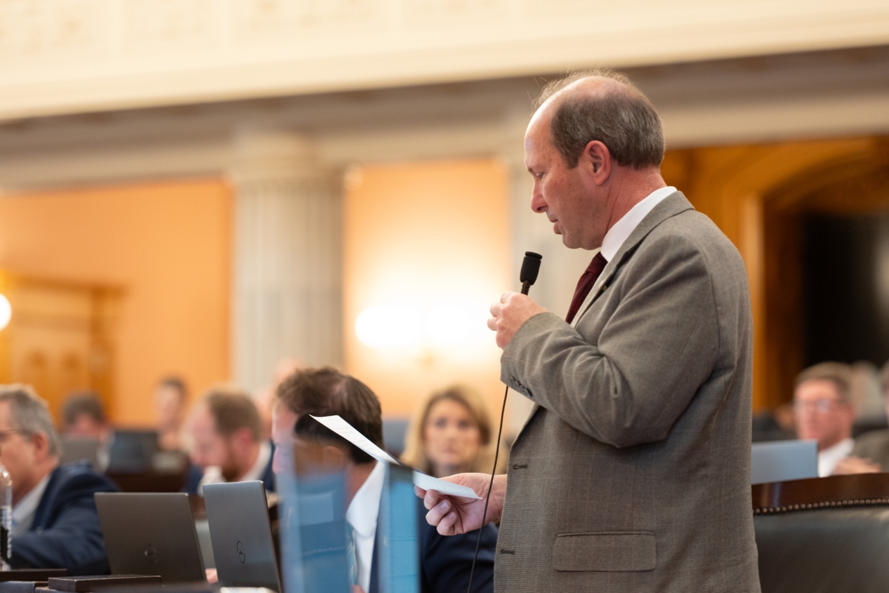 Rep. Klopfenstein speaks on the House floor during session