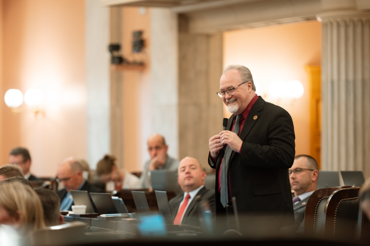 Rep. Daniels speaks on the House floor during session