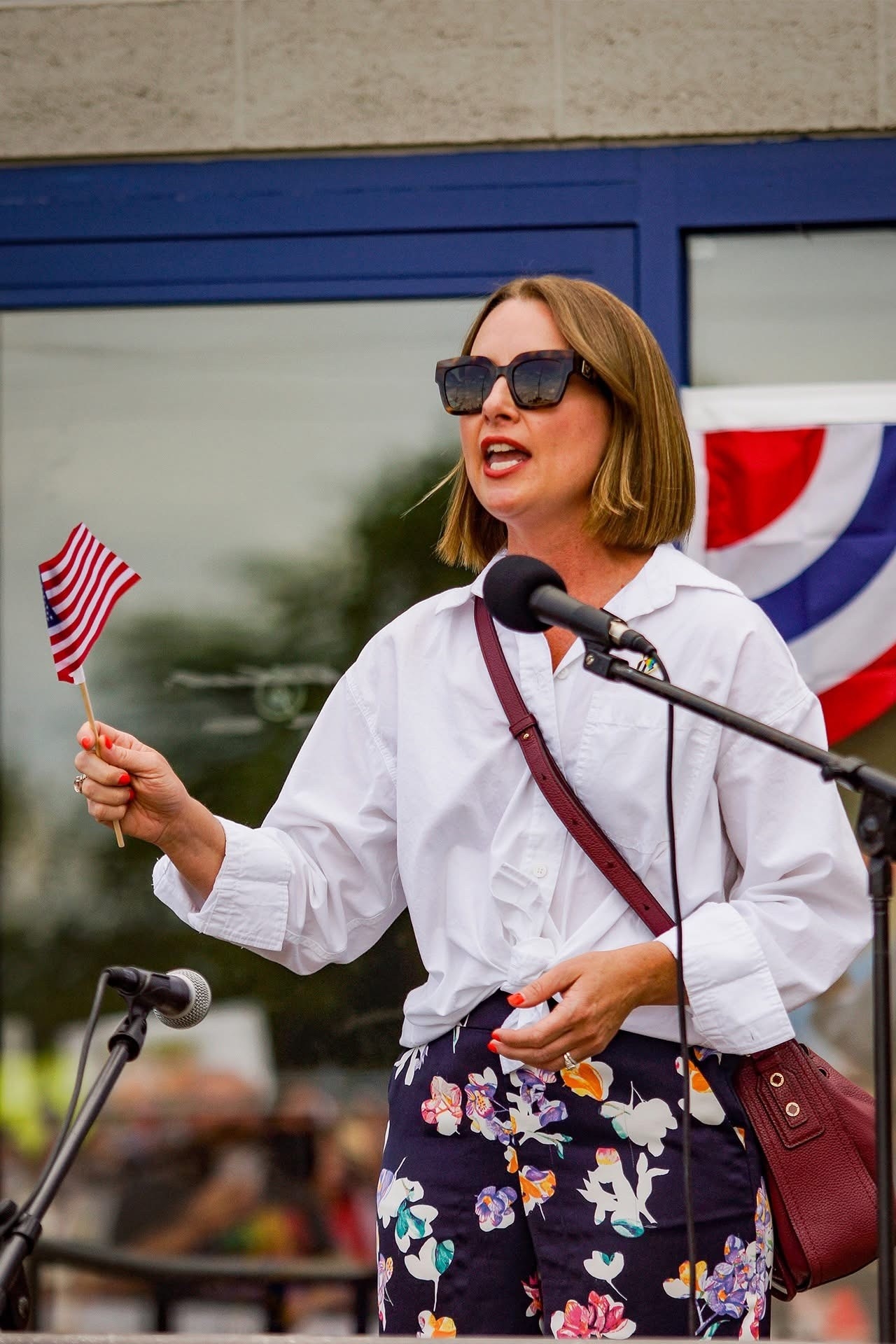 Rep. Lett offering remarks at a No Kings rally