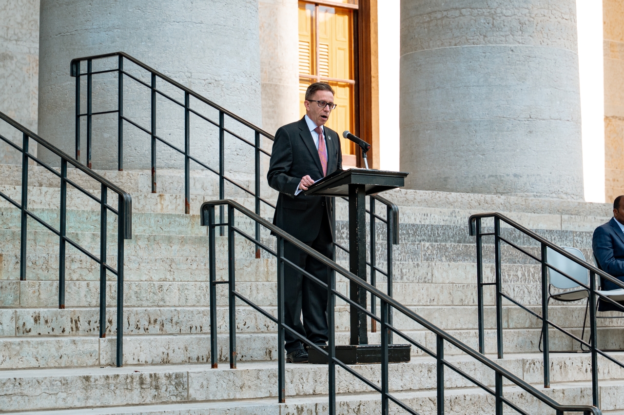 Rep. Dovilla speaks at the 9/11 Remembrance Flag Planting Event