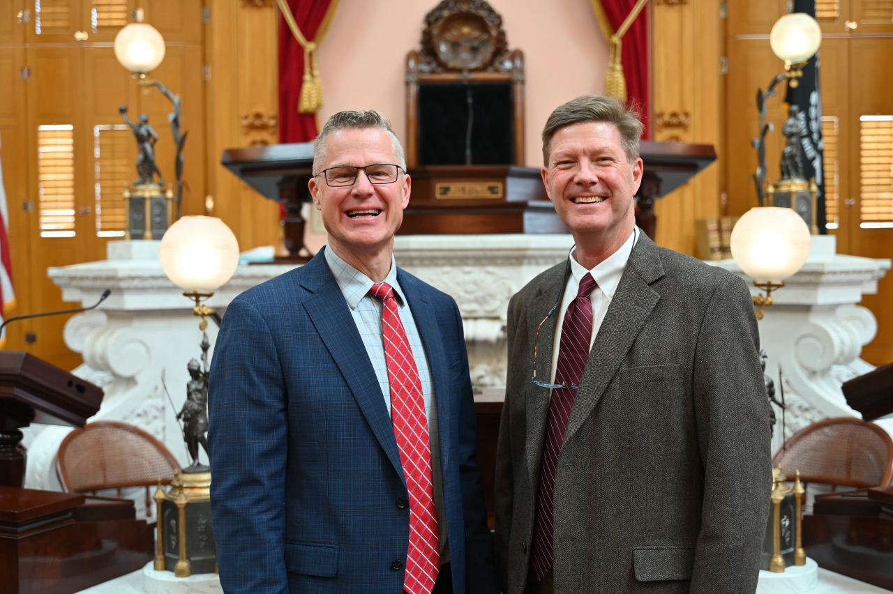 Representative Mark Hiner posing with constituent and friend Neal Dearyan before Neal gave the opening prayer at session