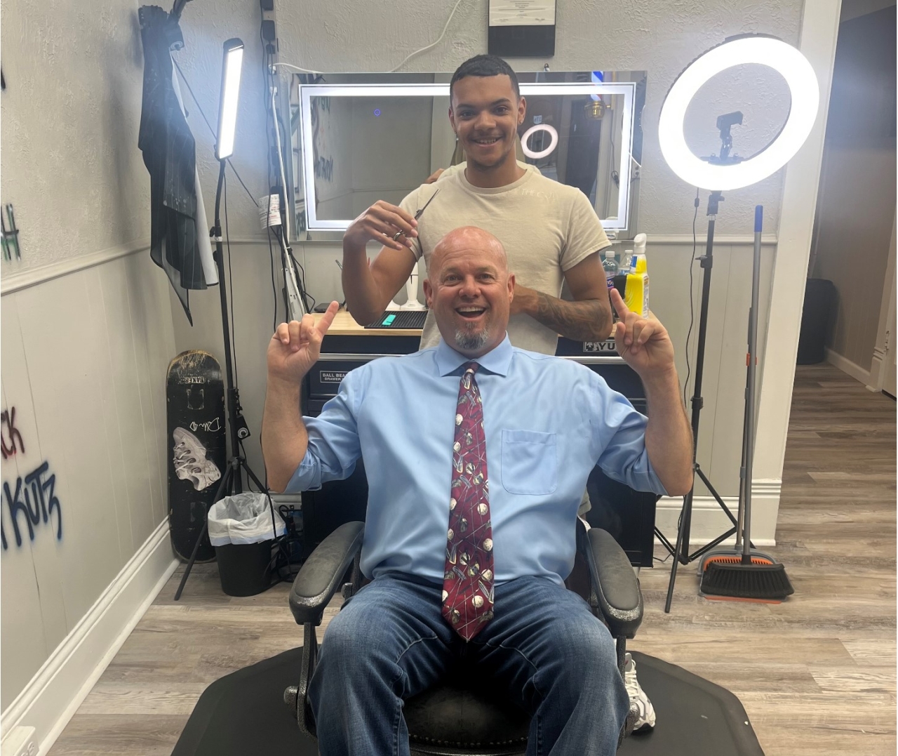 Rep. Moore is visiting an McConnelsville barbershop business in Morgan County