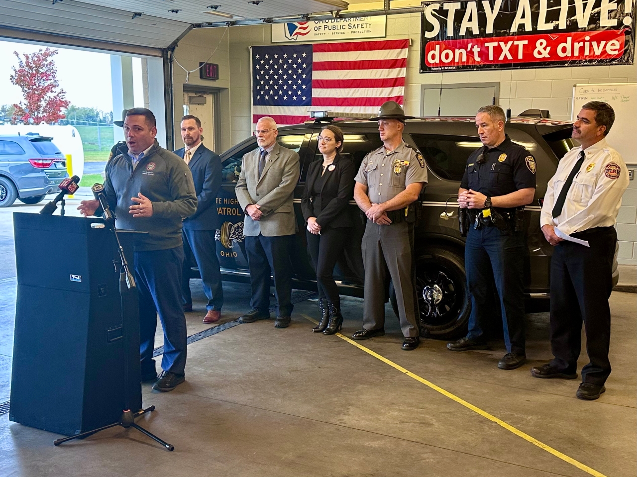 From left to right Wood County Sheriff Office Chief Deputy Rod Konrad, Wood County Health Commissioner Ben Robison,  Wood County EMA Director Jeff Klein, Wood County ADAMHS Board Executive Director Amanda Kern, Ohio State Highway Patrol Staff Lieutenant Scott Wyckhouse, Perrysburg Township Police Lieutenant Jason Gladney, and Assistant Bowling Green Fire Chief Luke Ward. 