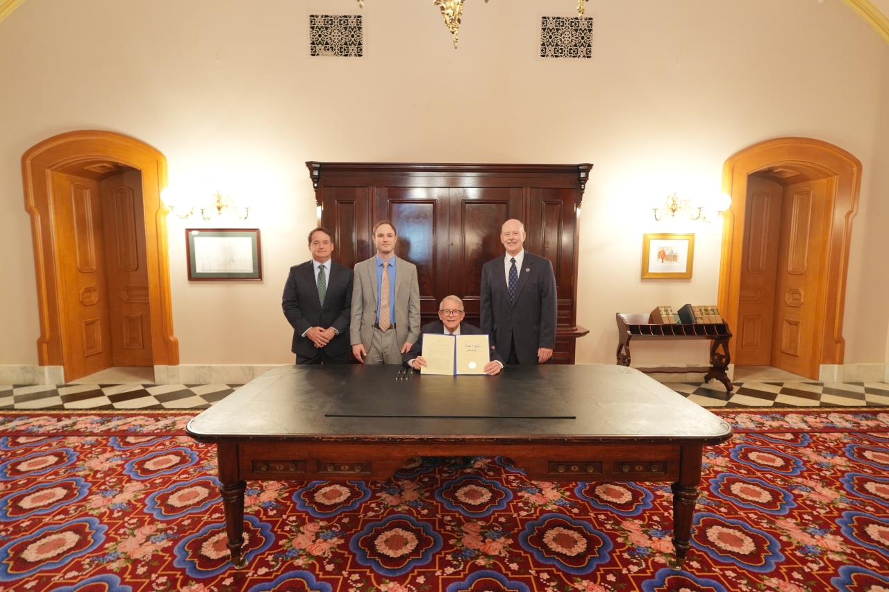 Rep. Roemer at the bill signing with the Governor